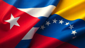 Banderas de Cuba y Venezuela ondeando juntas en un acto de unidad.